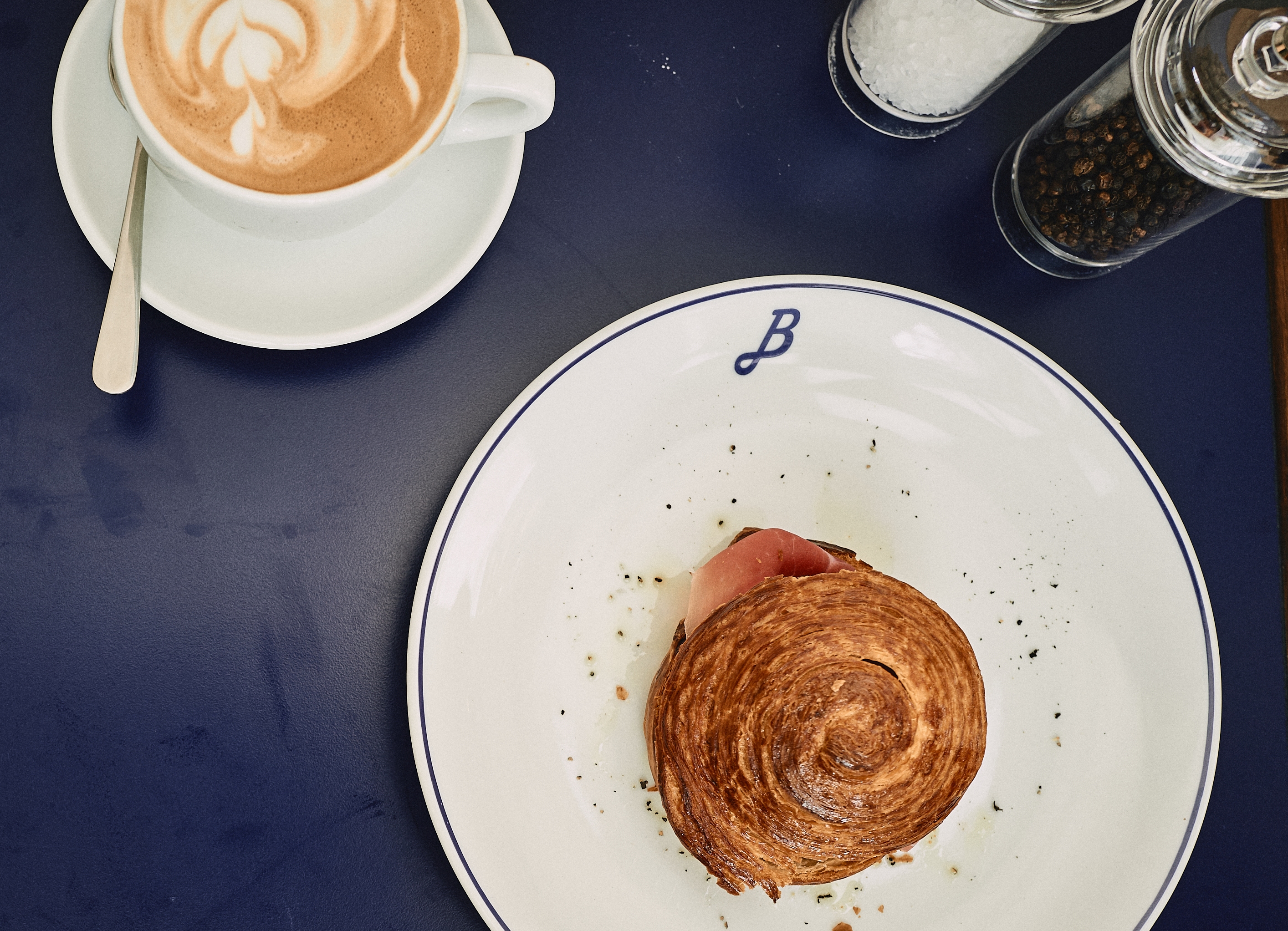 Perfect cappuccino with a croissant filled with Parma Ham: the best way to start the day!